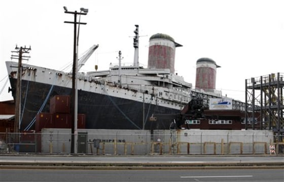 The SS United States is seen moored on the Delaware River in Philadelphia on July 9. Caretakers for the legendary ocean liner are renewing and expanding their distress call for the beleaguered piece of American maritime history.